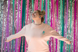 Palm Springs pink sweater