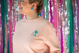 Palm Springs pink sweater